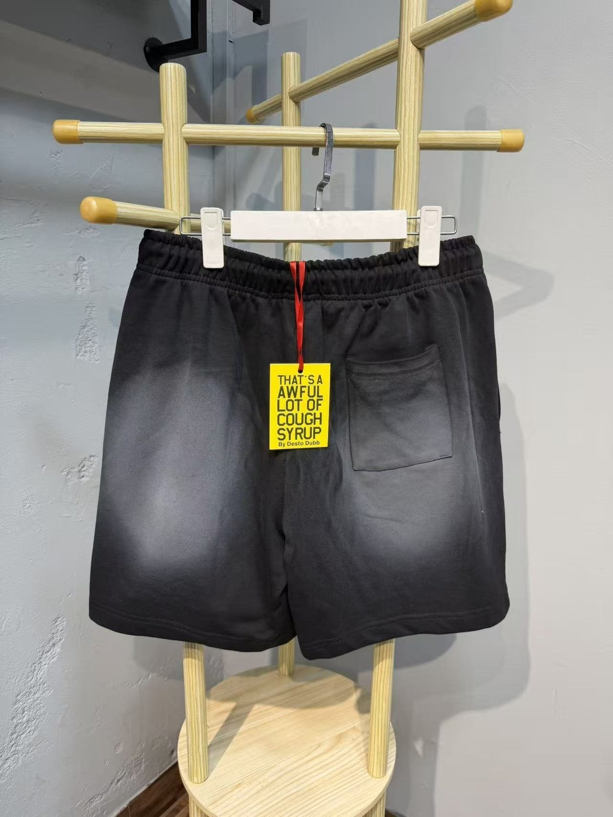 THAT'S A AWFUL LOT OF COUGH SYRUP Black Graphic Drawstring Shorts