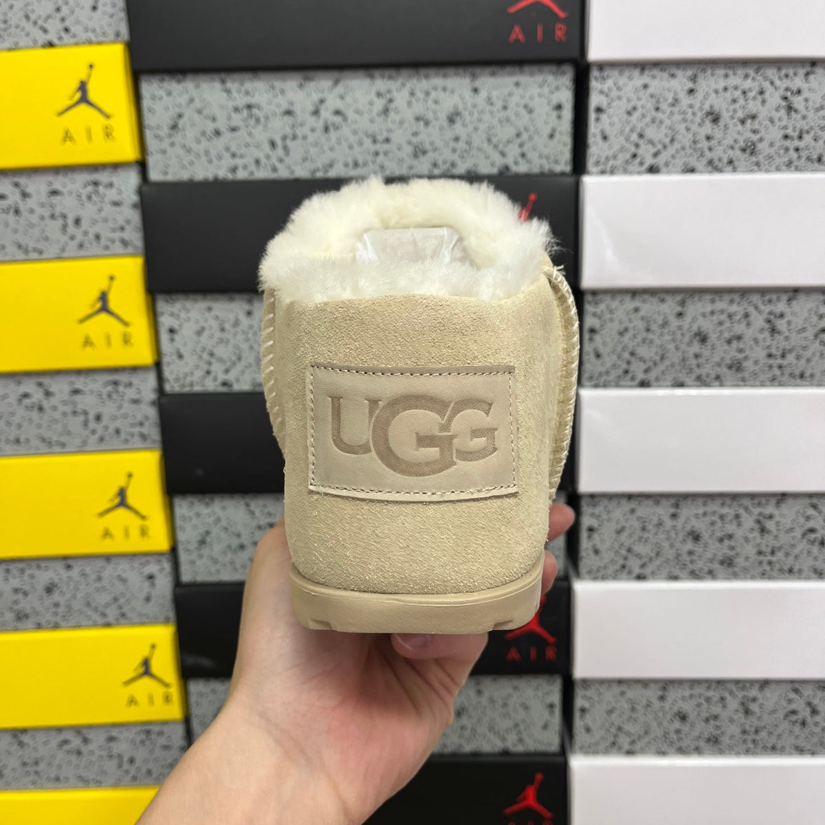 UGG Classic Ultra Mini Boot – Suede Ankle Boot with Shearling Lining, Embossed Logo Patch & Sand Lug Sole in Sand