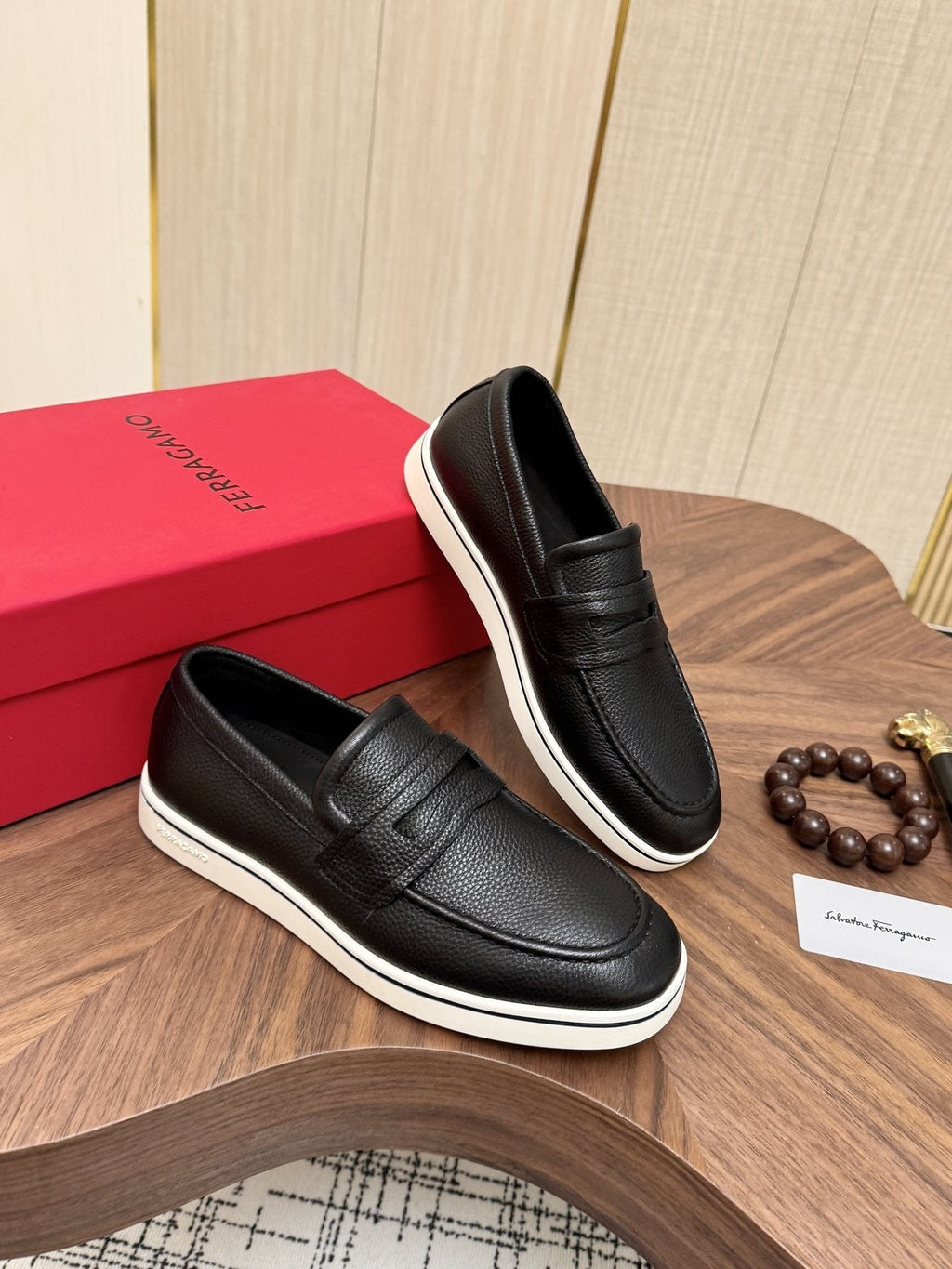Salvatore Ferragamo Black Loafers with White Soles