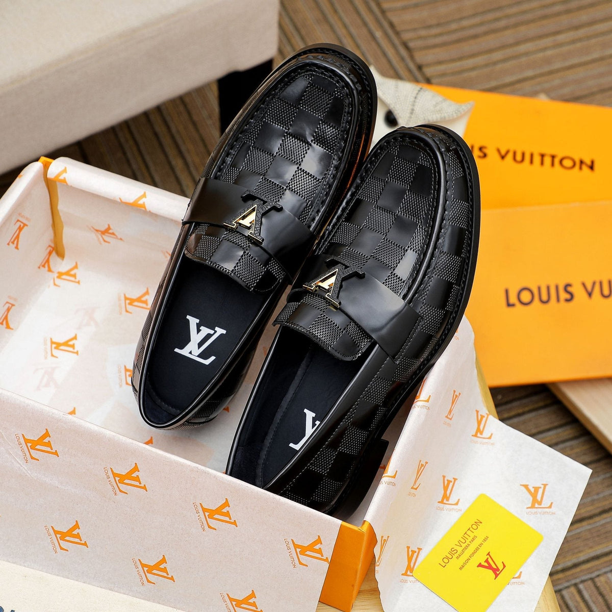 Louis Vuitton Men's Black Woven Leather Loafers