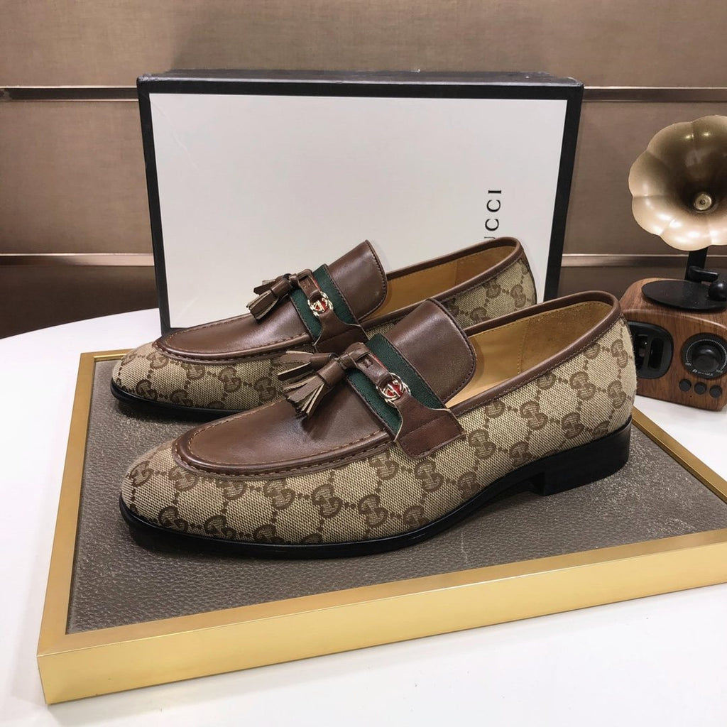 Gucci Monogram Tassel Loafers
