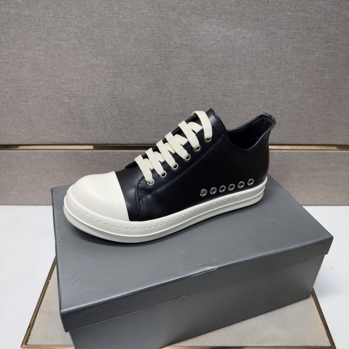 Black and Off-White Low-Top Sneakers